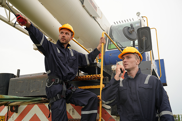 construction workers coordinating operations